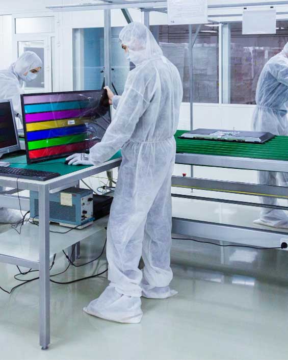 Persons working inside biological safety cabinet conducting sterile microbiology research safely
